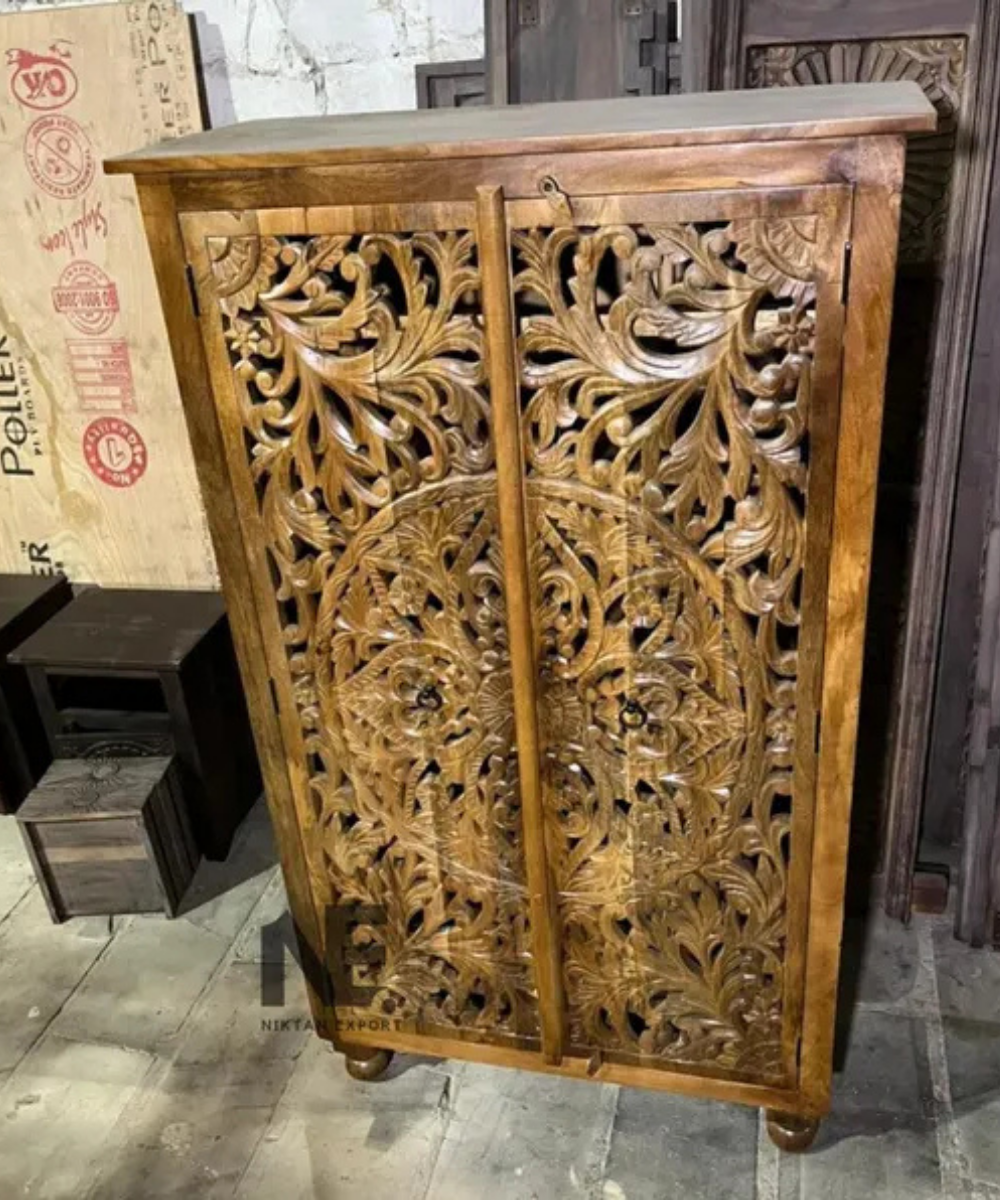 mango wood wardrobe with carved geometric doors