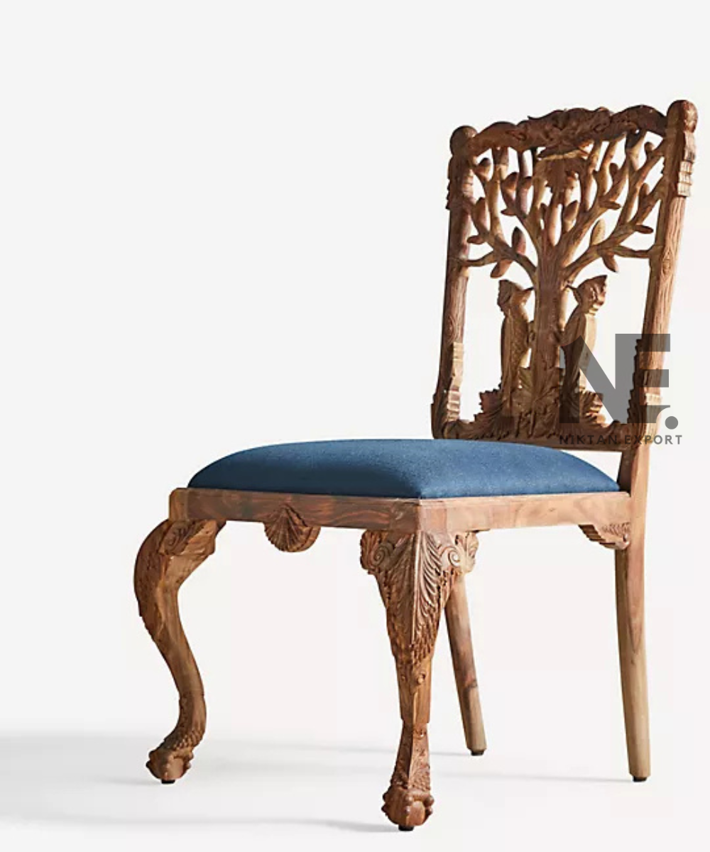 Decorative tree motif carved into wooden chair back