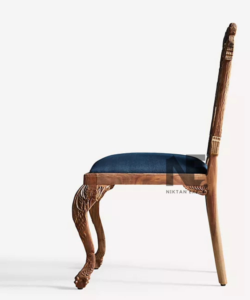 Floral carving details on a handcrafted wooden chair