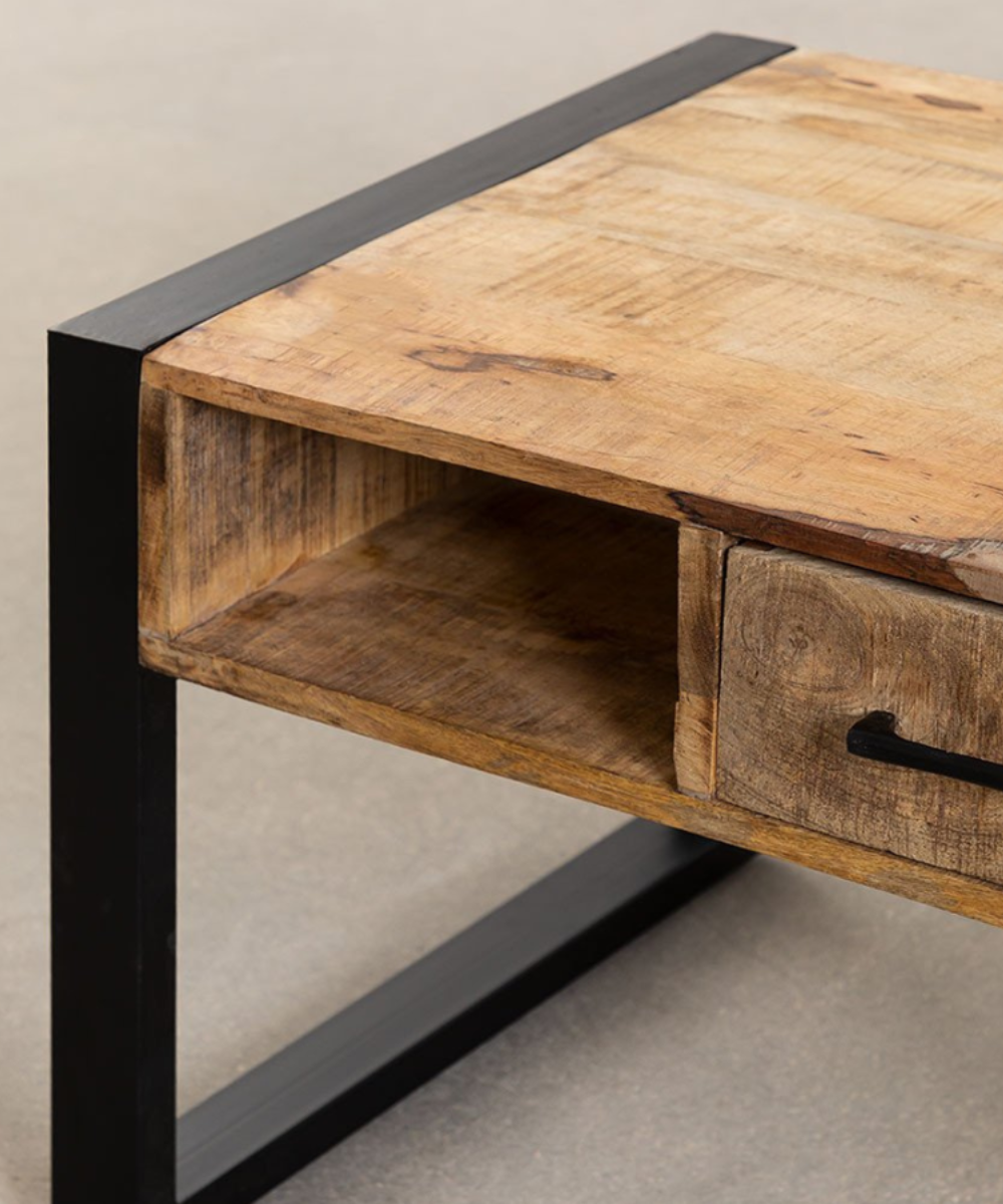 Detail of sturdy iron legs supporting the table