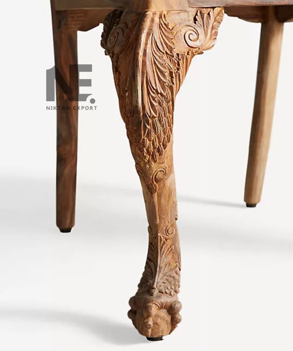Navy-blue upholstered seat on a carved wooden chair