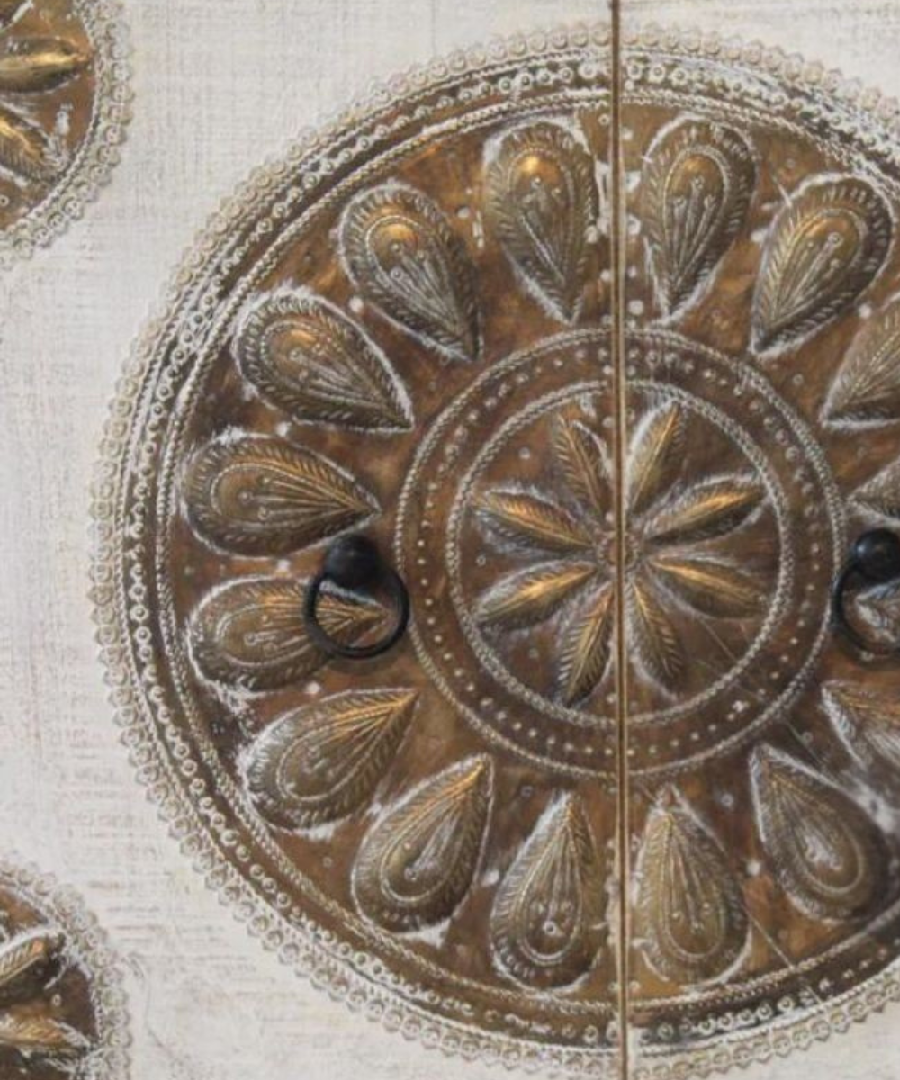Close-Up of Handcrafted Brass Fittings on Sideboard