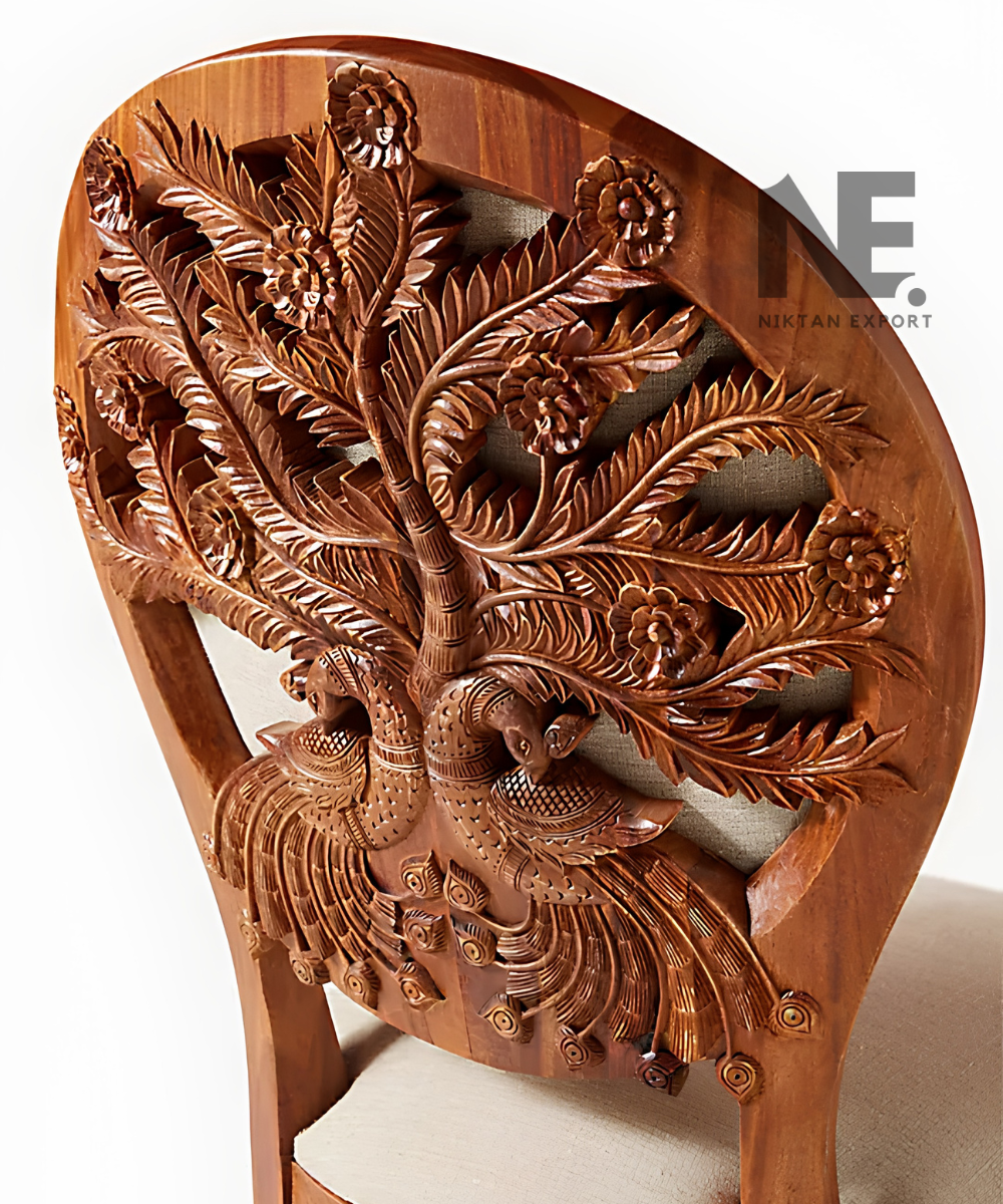 Bird motifs carved into a wooden dining chair backrest
