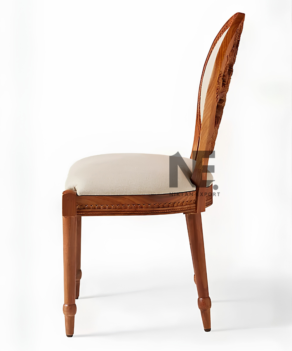 Rear view of hand-carved wooden dining chair