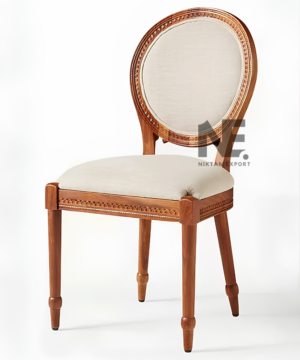 Decorative floral carving on the back of a wooden chair
