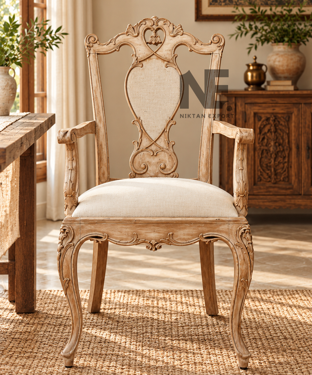 Hand-carved wooden armchair with cream upholstered seat