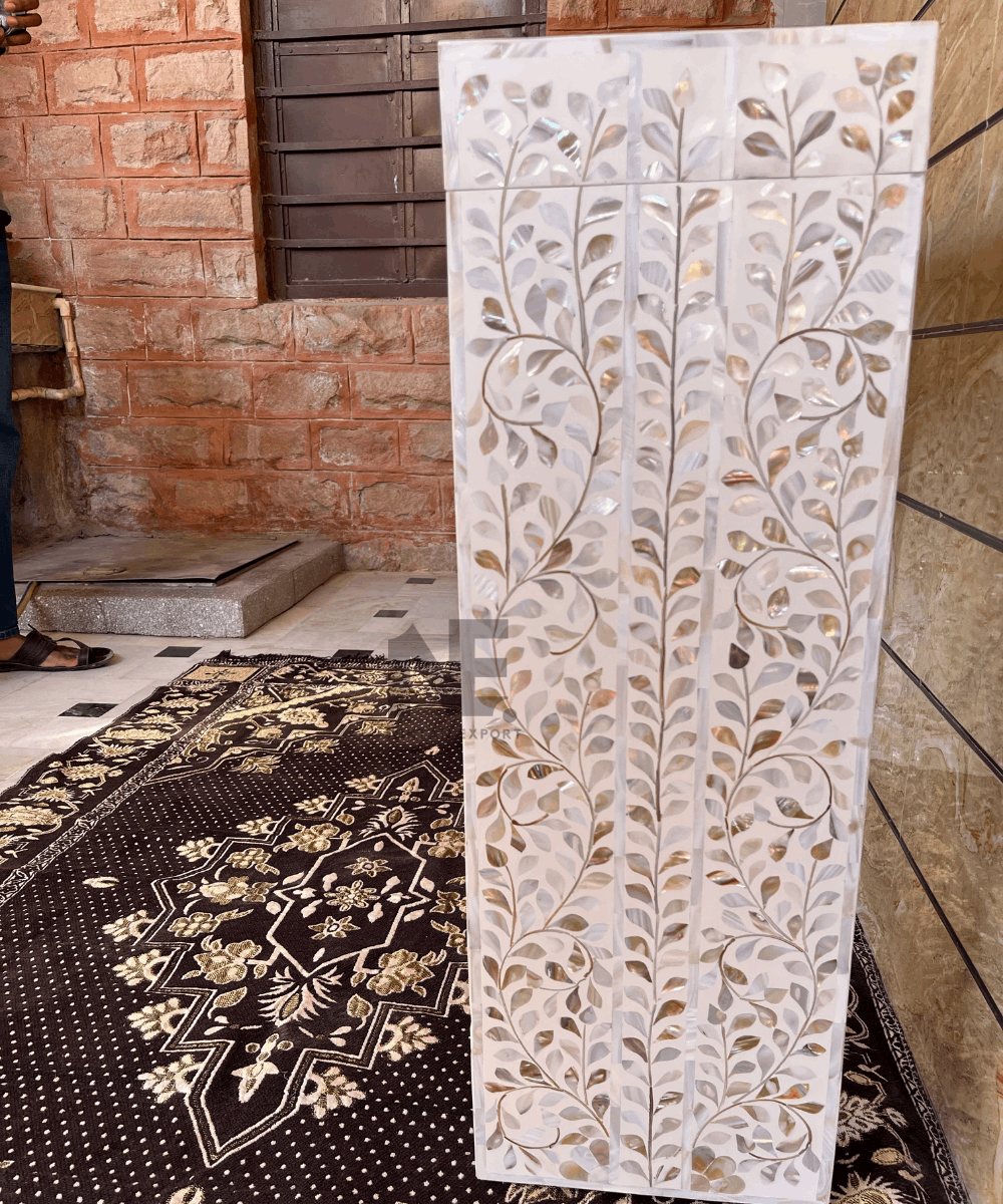 Console table in entryway with décor styling