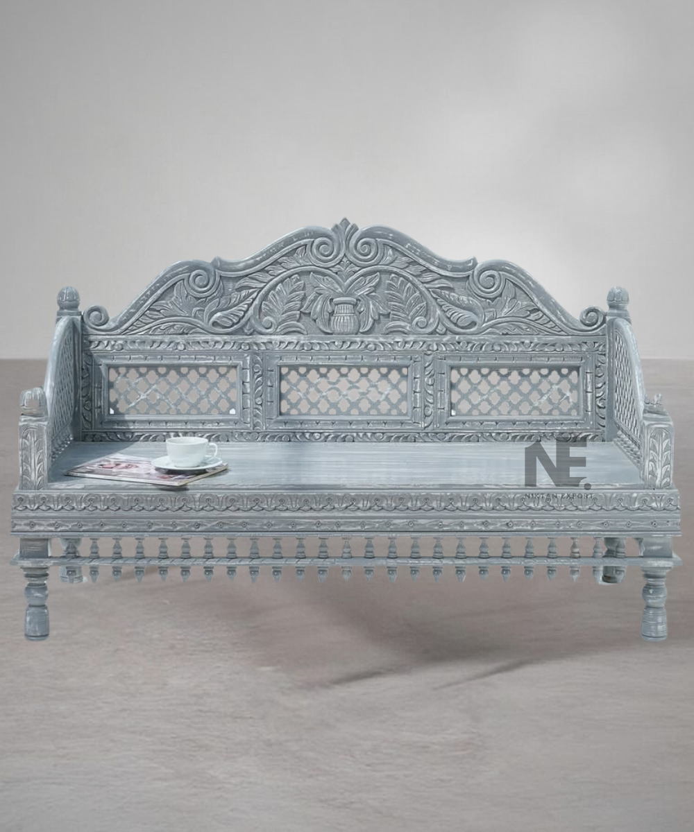 Hand-carved wooden daybed front view