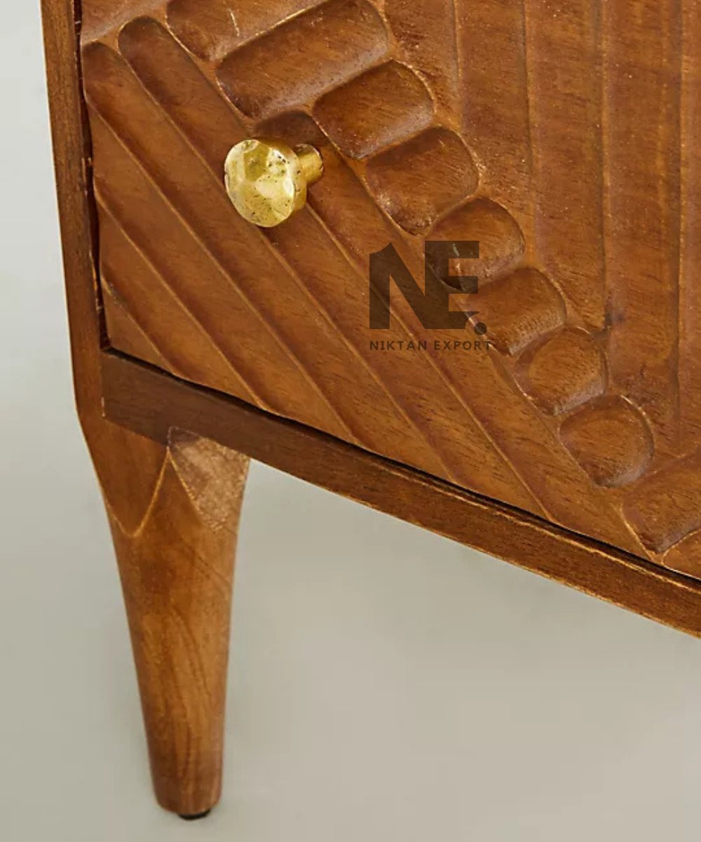 Close-up of geometric detailing on wooden dresser