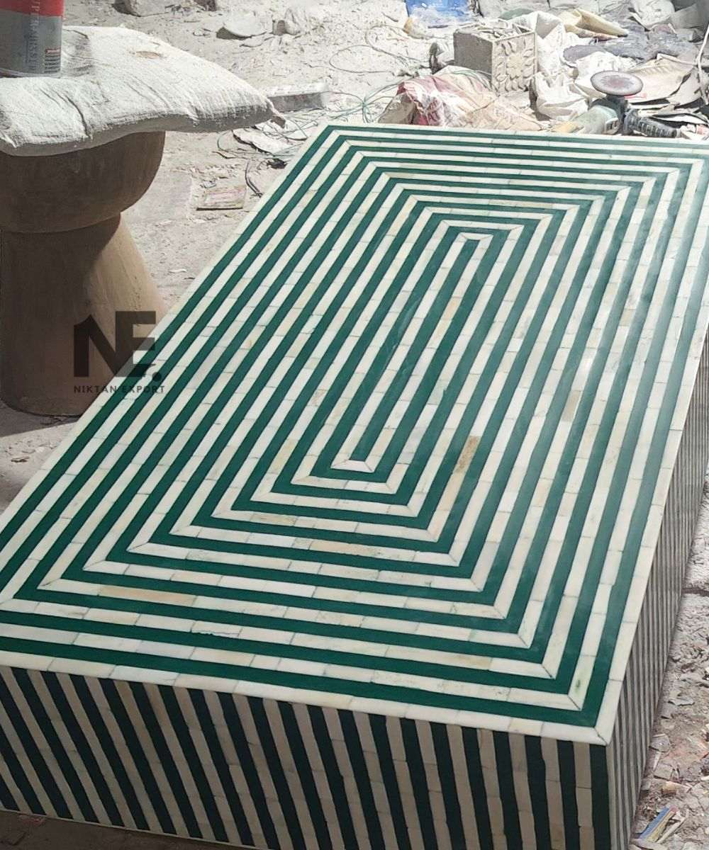 Detail of brass base and matte green finish