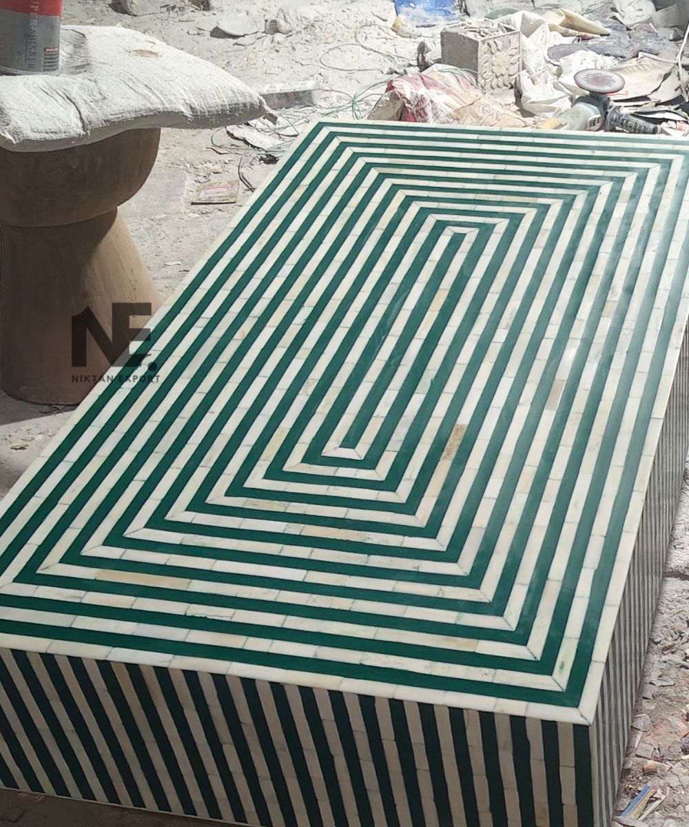 Detail of brass base and matte green finish