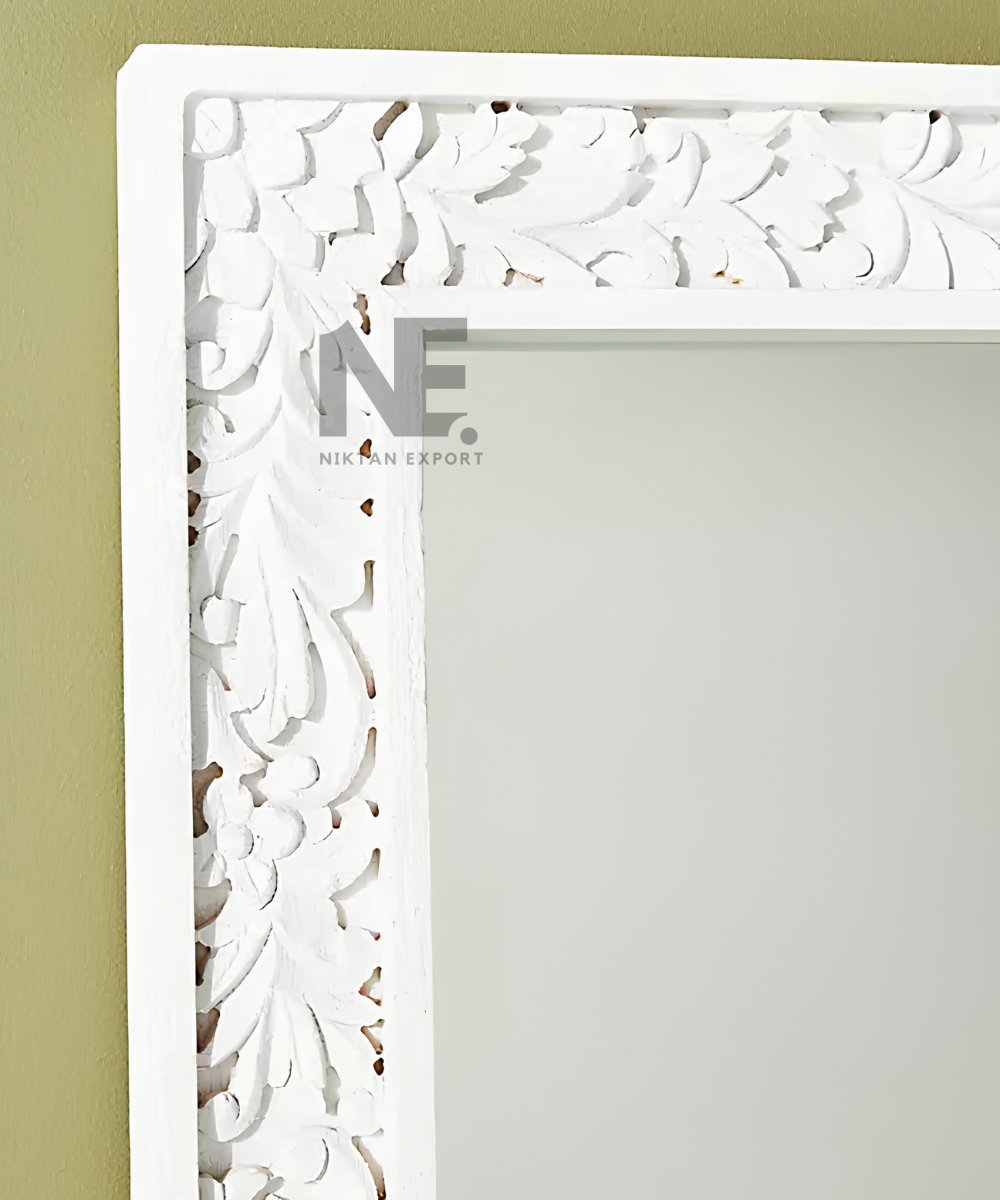 White rectangular wall mirror with botanical frame