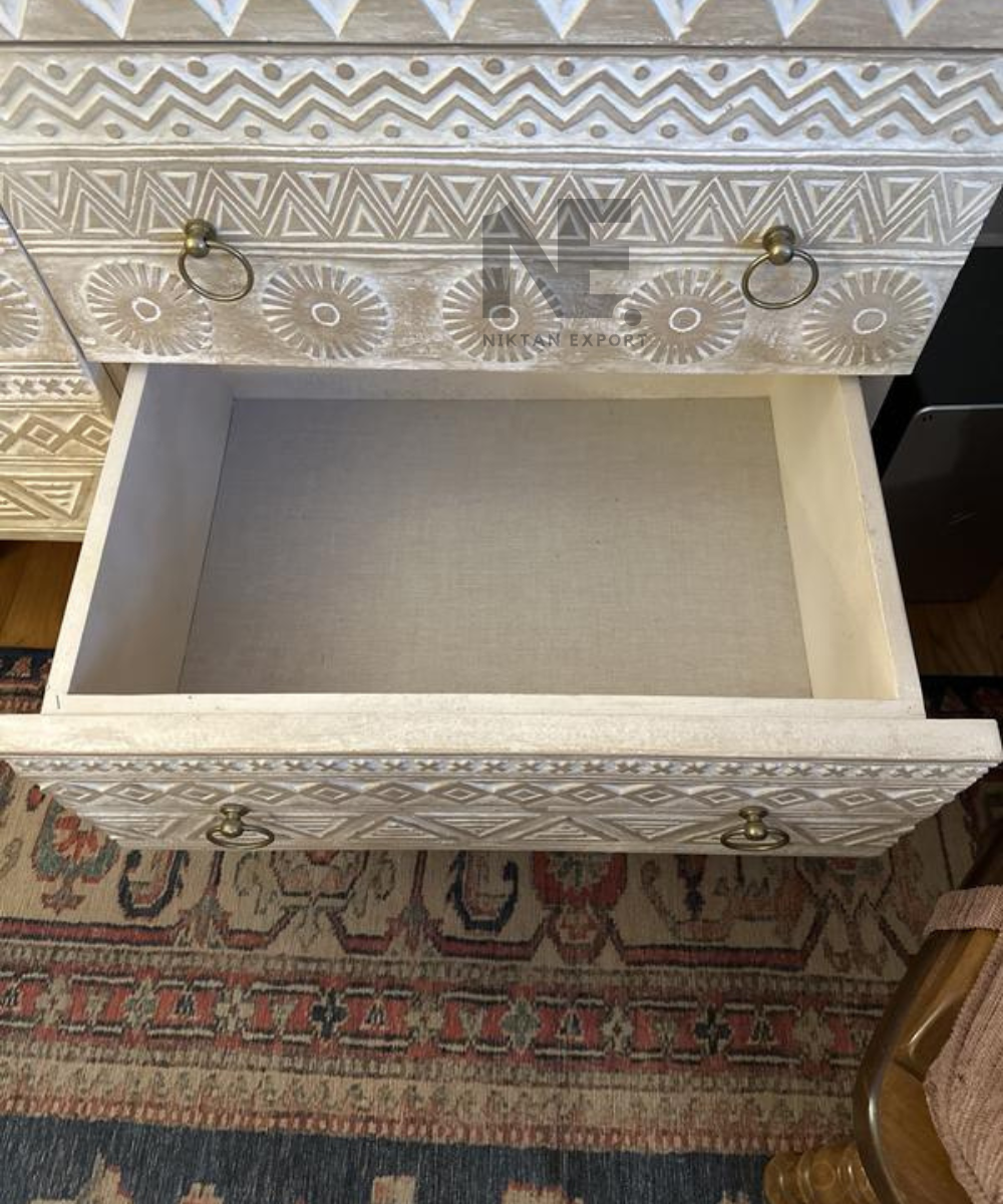 Close-up of decorative patterns on carved sideboard