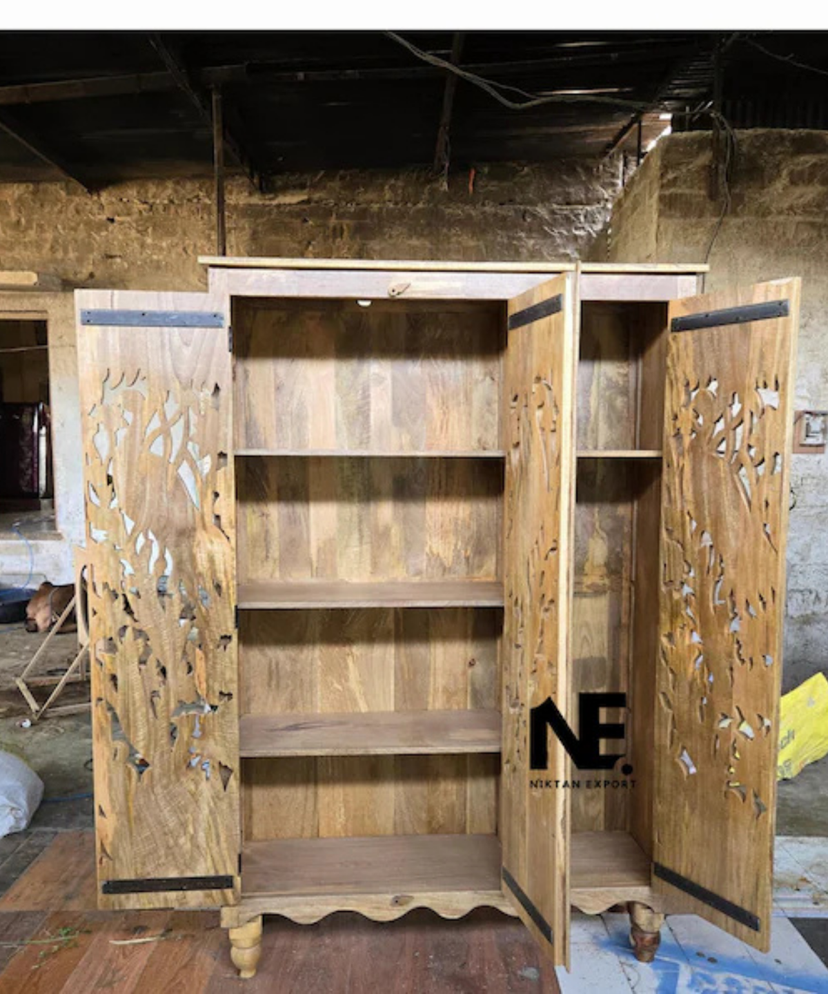 handmade wooden wardrobe with peacock artwork