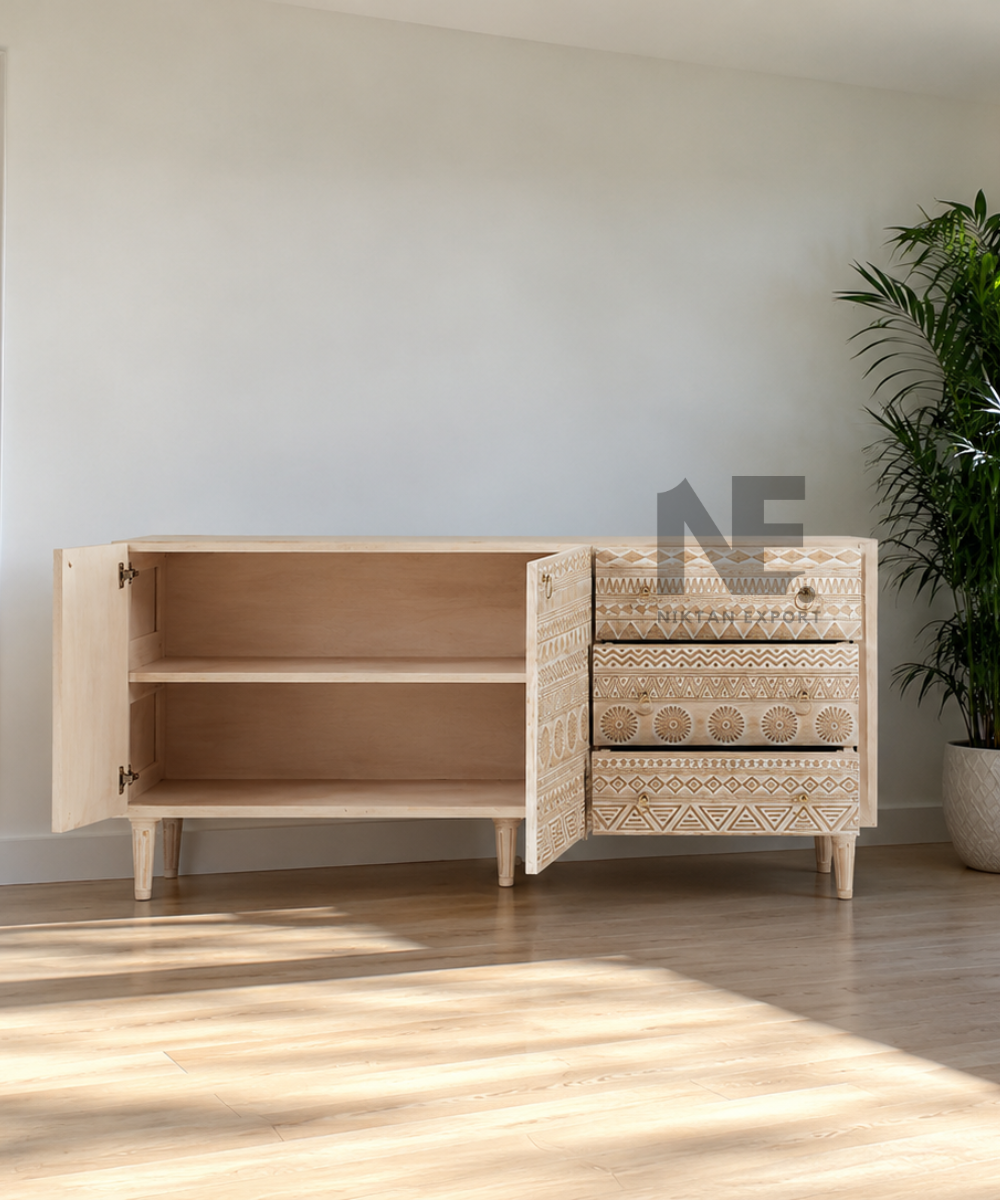 Whitewashed sideboard with patterned cabinet fronts