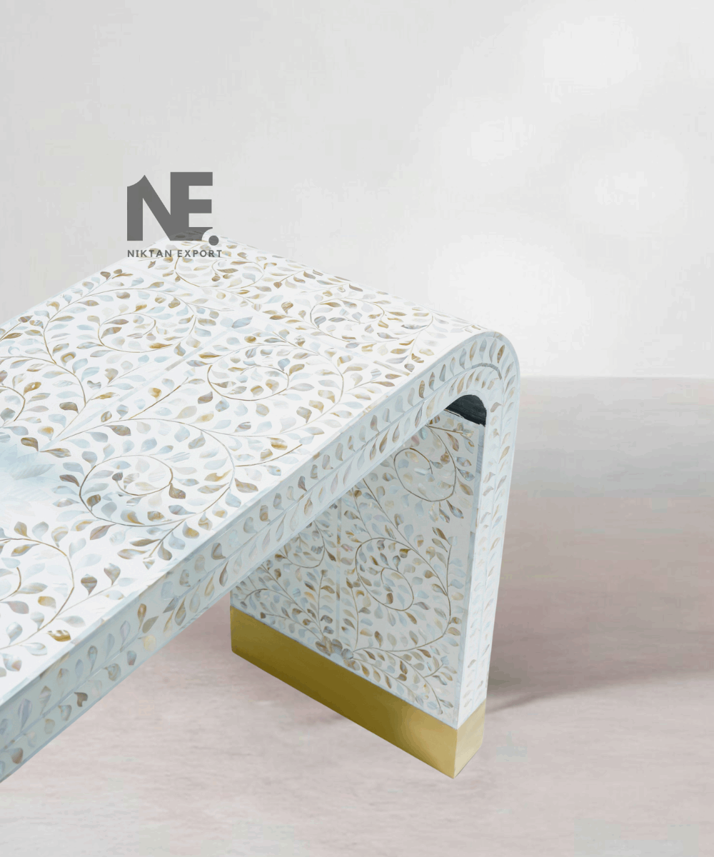 Close-up of floral inlay pattern on console surface