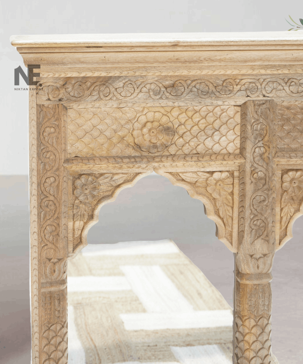 Wooden mirror styled above a console table