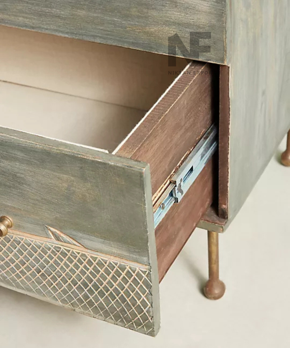 Weathered grey wooden sideboard with brass-tone knobs