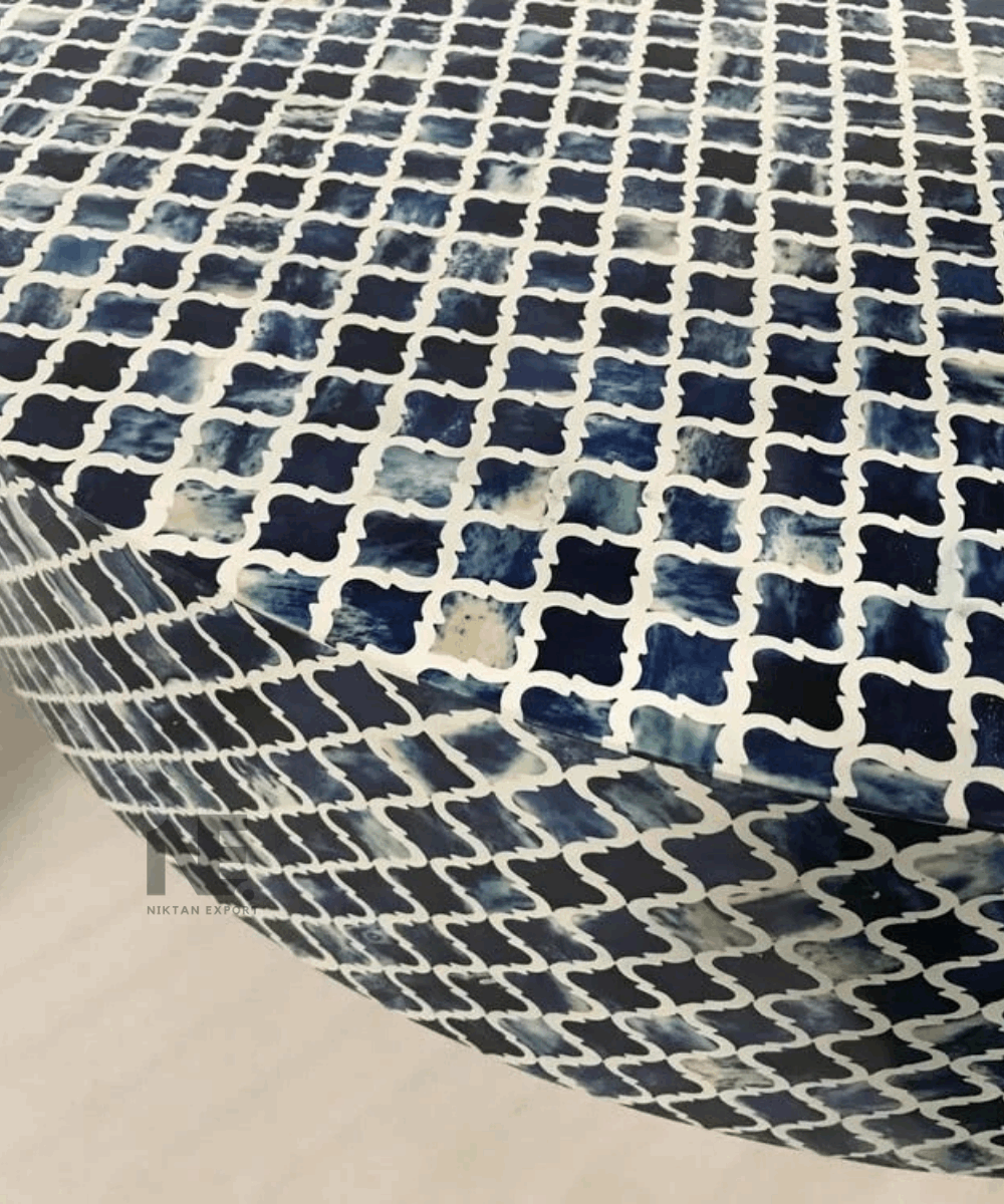 Artisan working on geometric bone inlay