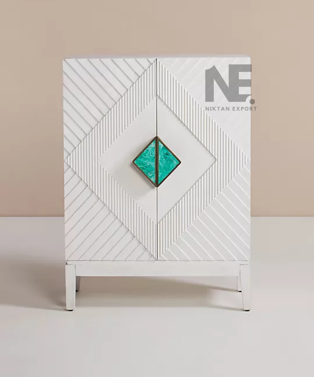 White cabinet with raised diagonal door detailing
