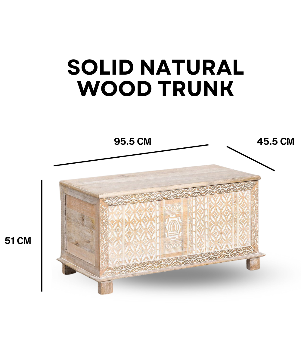 Trunk placed in an entryway with decorative accents