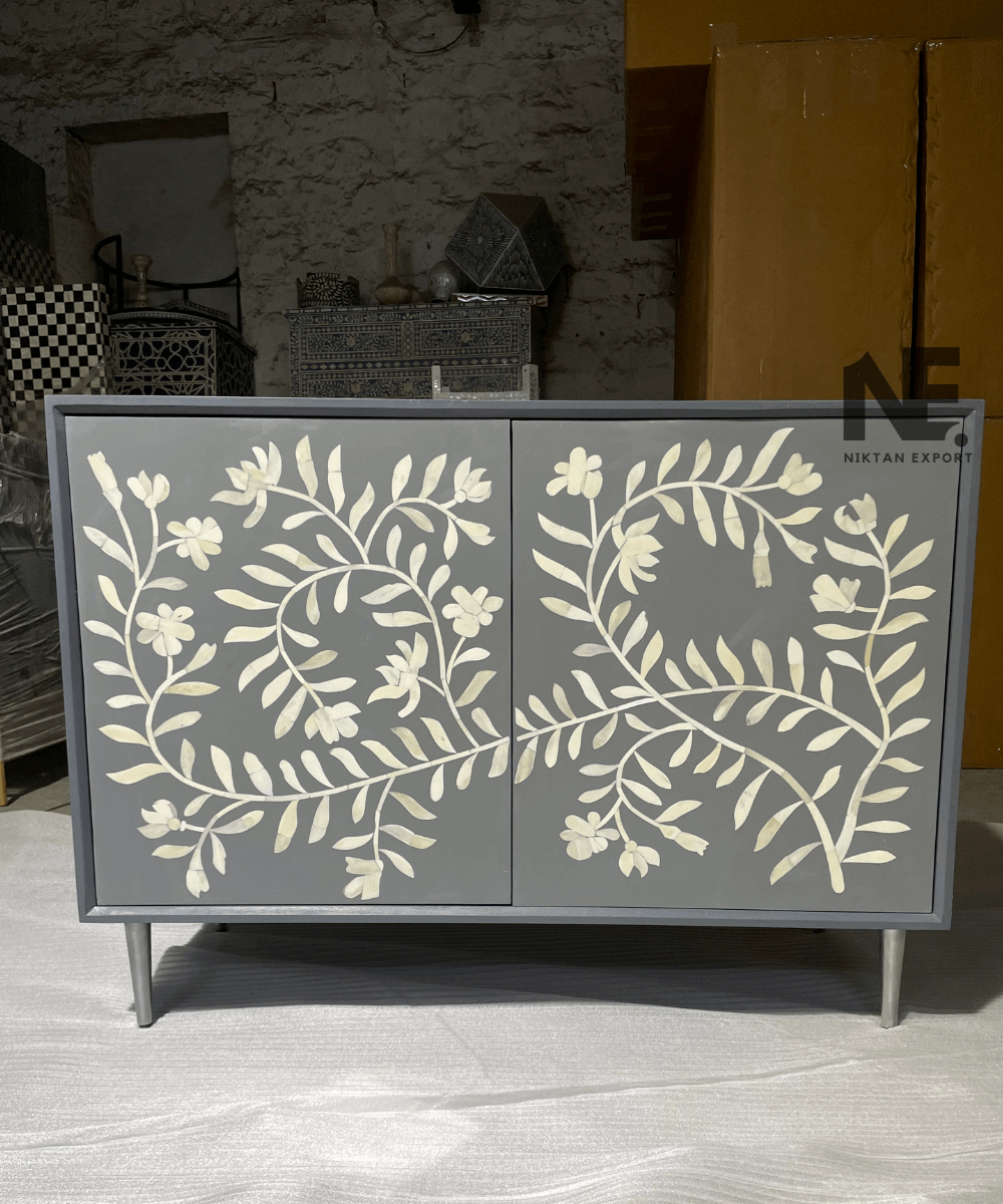 Front view of bone inlay chest of drawers with 2-door cabinet