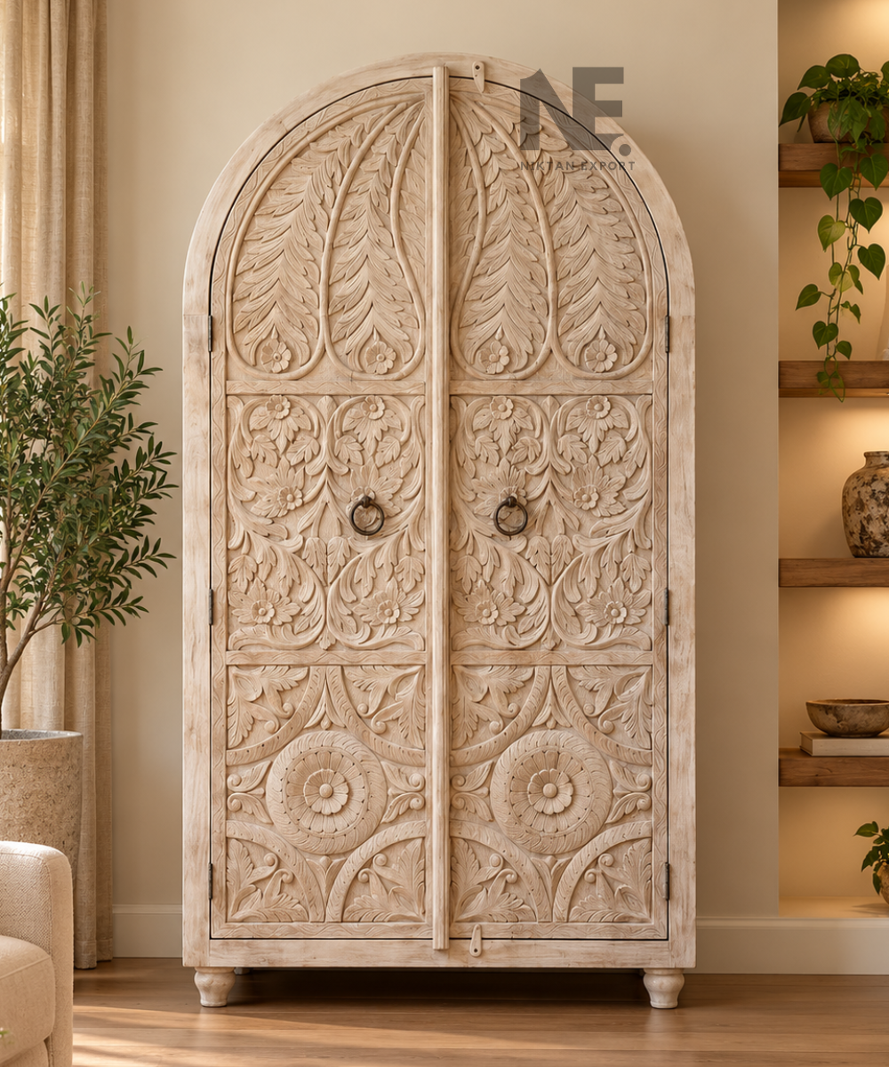 Hand-carved wooden armoire with arched floral doors
