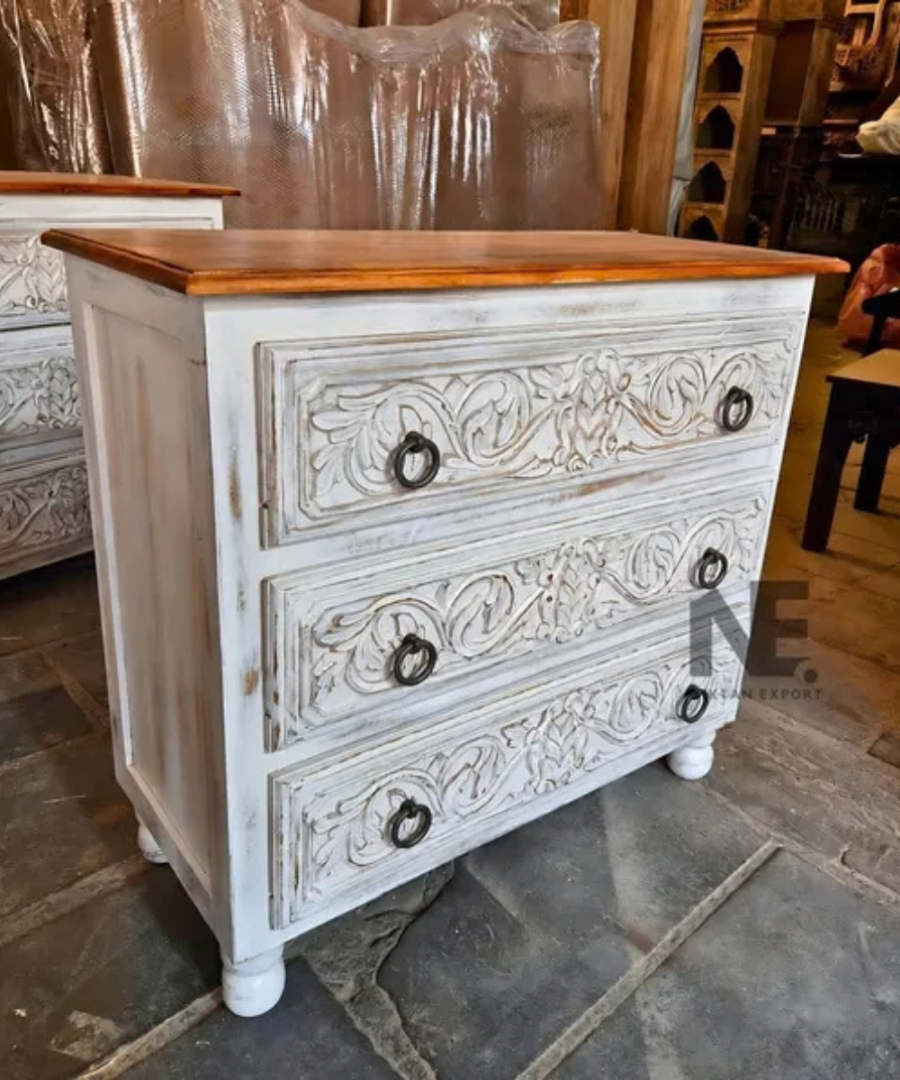 hand carved wooden chest with three drawers