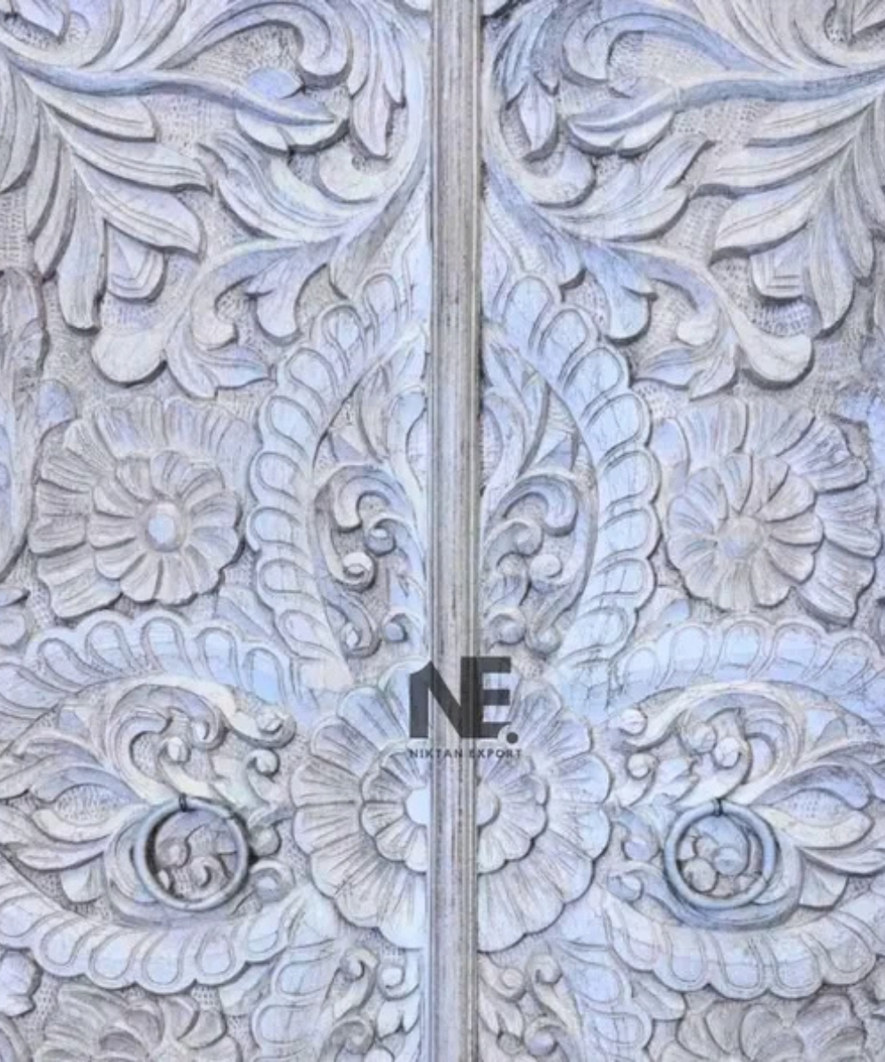 Front view of hand-carved floral mango wood wardrobe