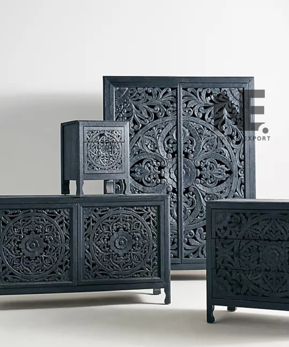Black cabinet featuring symmetrical mandala wood carving