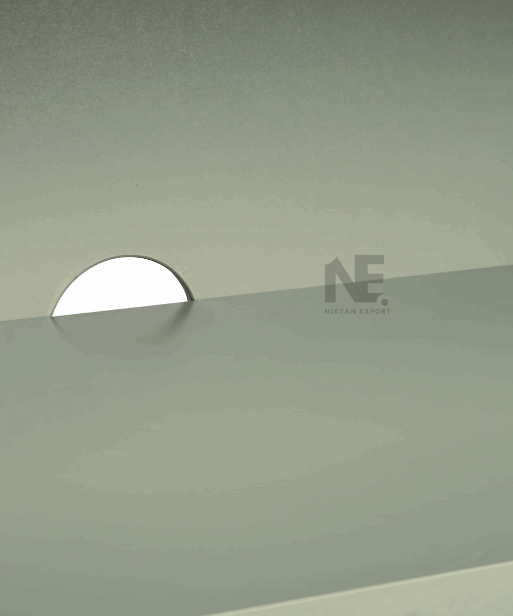 Close-up of white bone inlay detail on grey resin surface