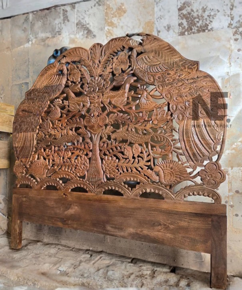 Woodland-inspired hand-carved mango wood bed