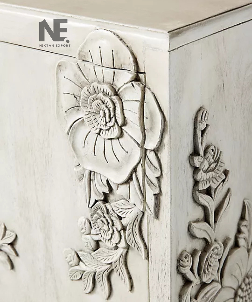 Ivory sideboard with decorative flower and branch motifs