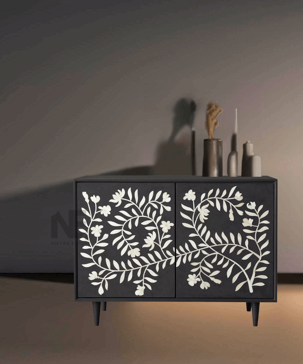 Front view of black bone inlay chest of drawers and cabinet