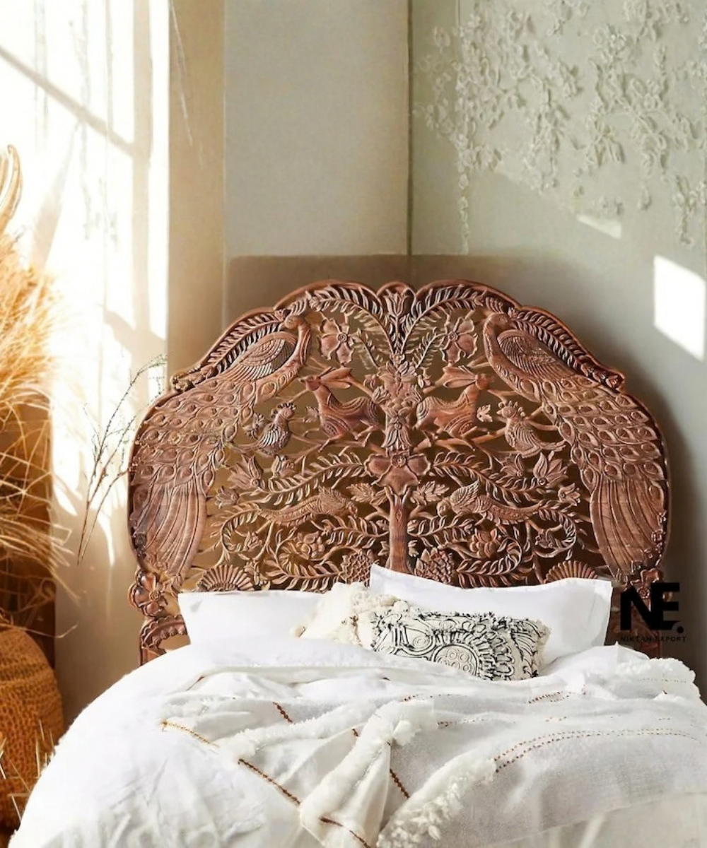 Solid mango wood bed with woodland carving