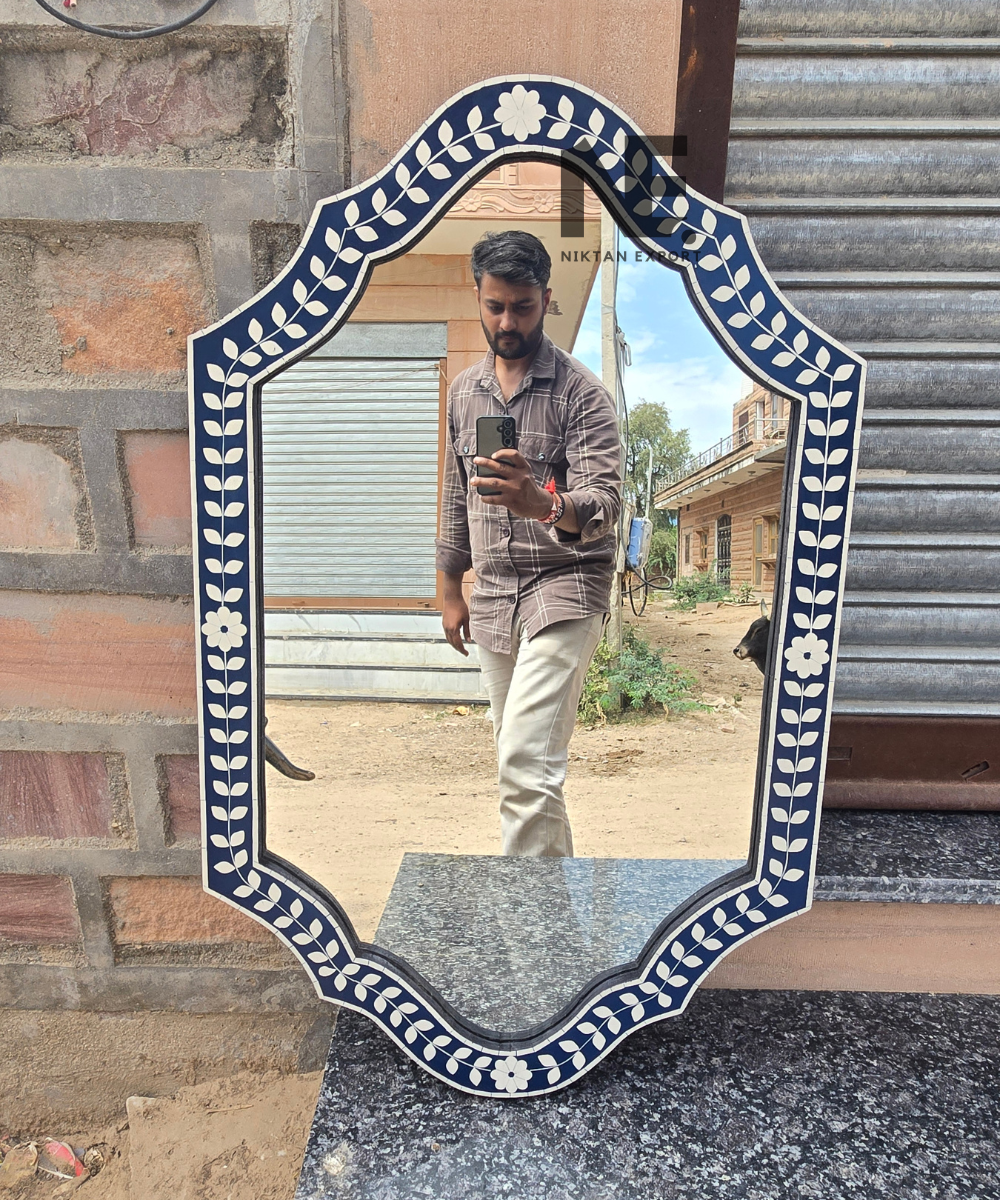 Front view of navy blue floral decorative mirror