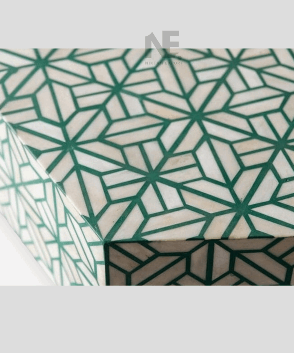 Artisan working on hexagon bone inlay table