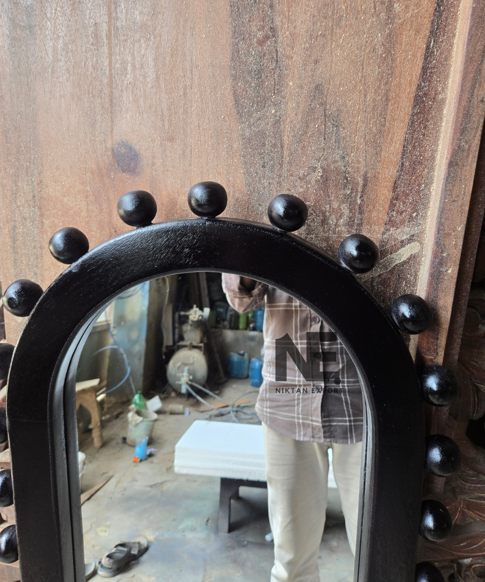 Decorative black mirror for bedroom interior styling