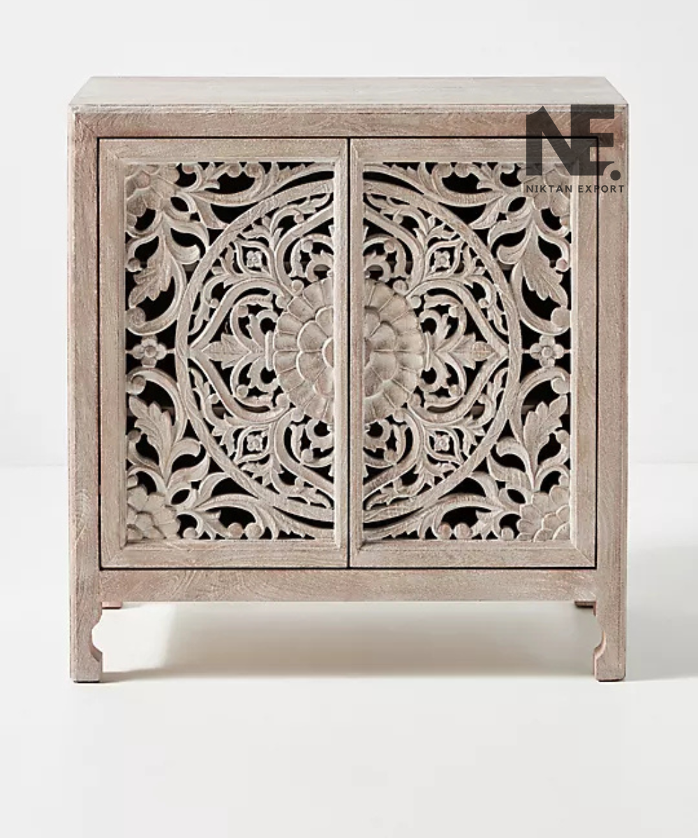 Whitewashed taupe cabinet with intricate floral woodwork