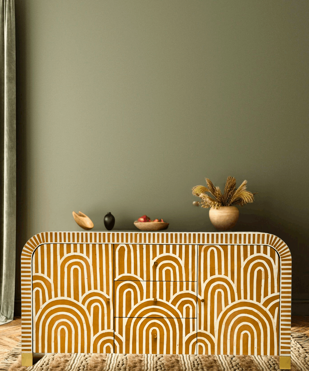 A side angle showcasing the intricate handcrafted bone inlay patterns