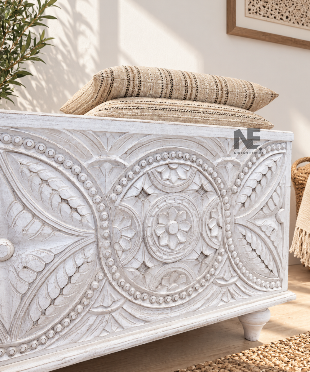 Decorative carved wooden blanket chest in an off-white finish