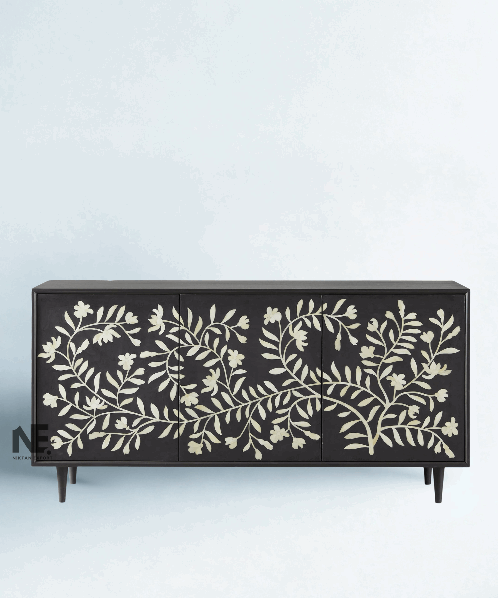 Front view of black bone inlay media console with floral doors