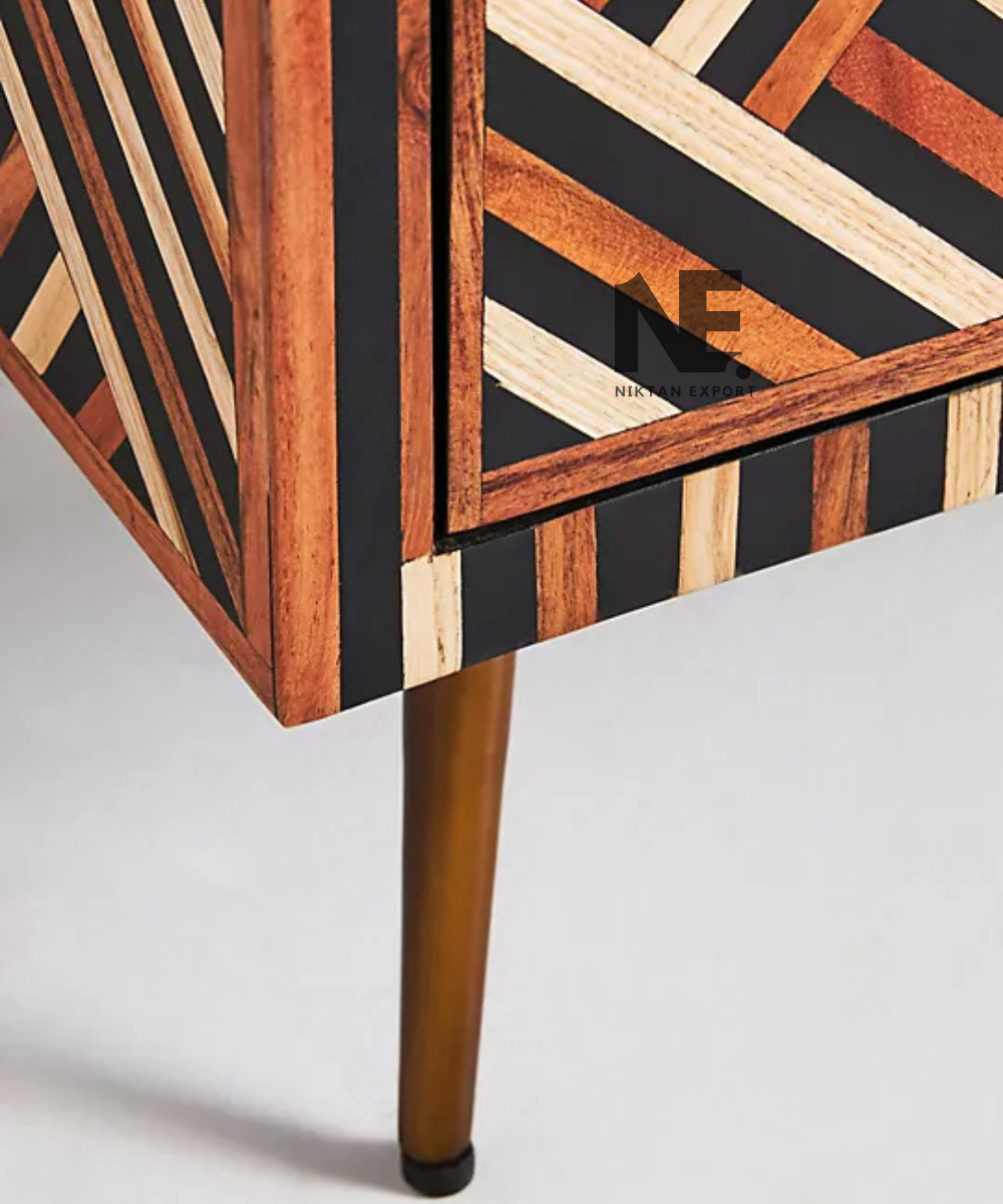 Close up of geometric inlay pattern on sideboard doors