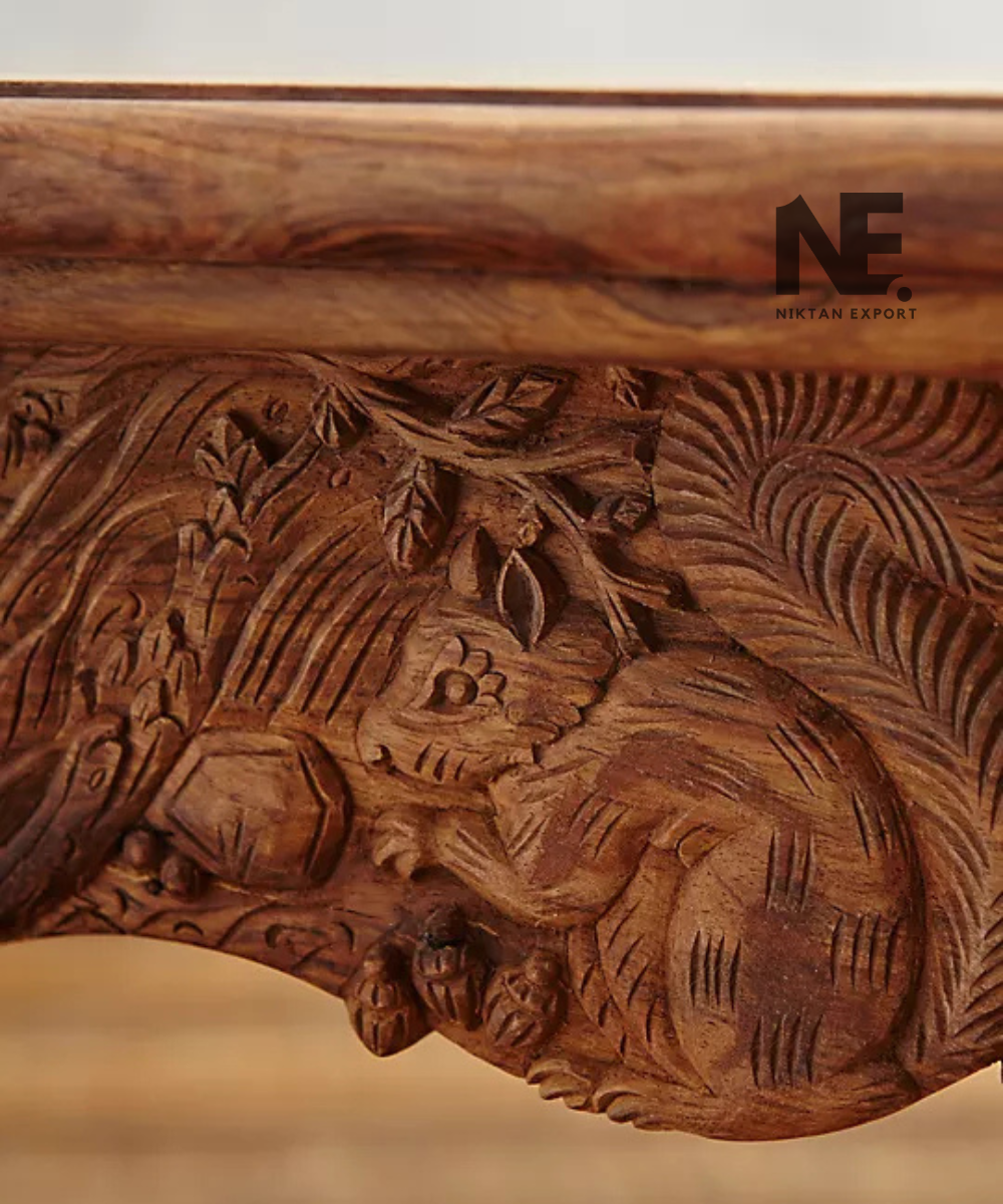 Detailed animal carving on handcrafted wooden furniture