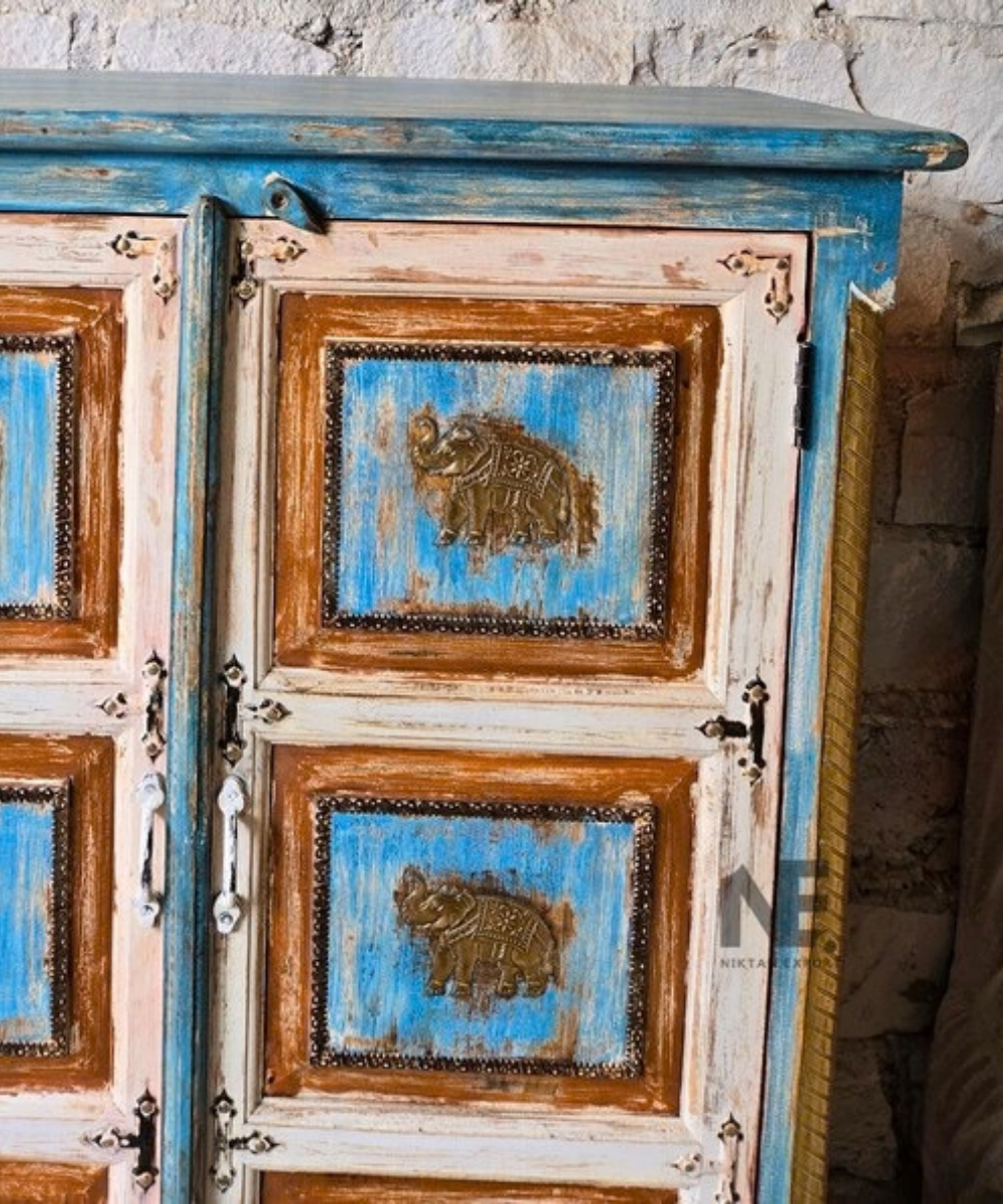 Elephant carved wooden cabinet with double doors
