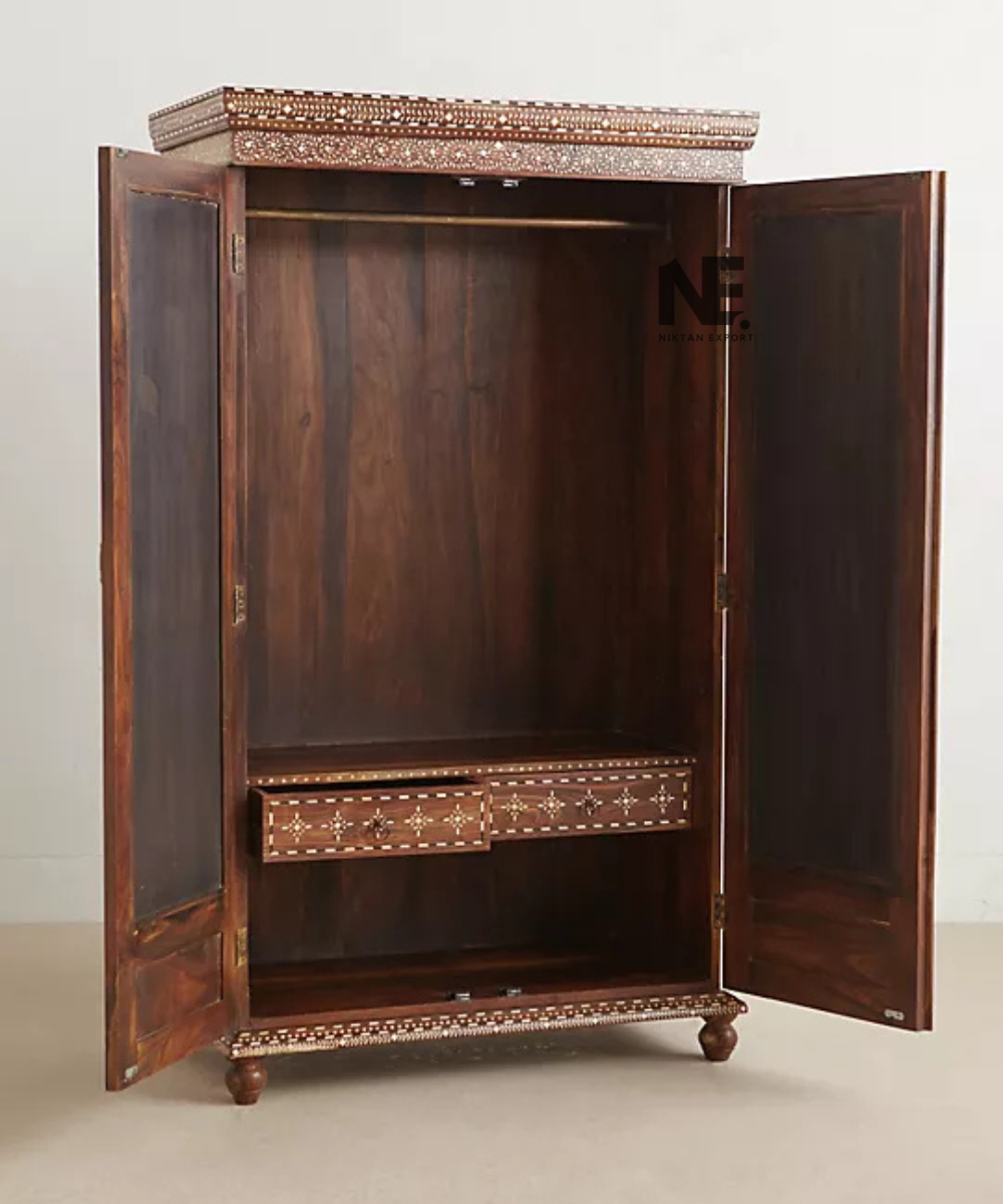 Full-length mirrors on ornate wooden armoire doors