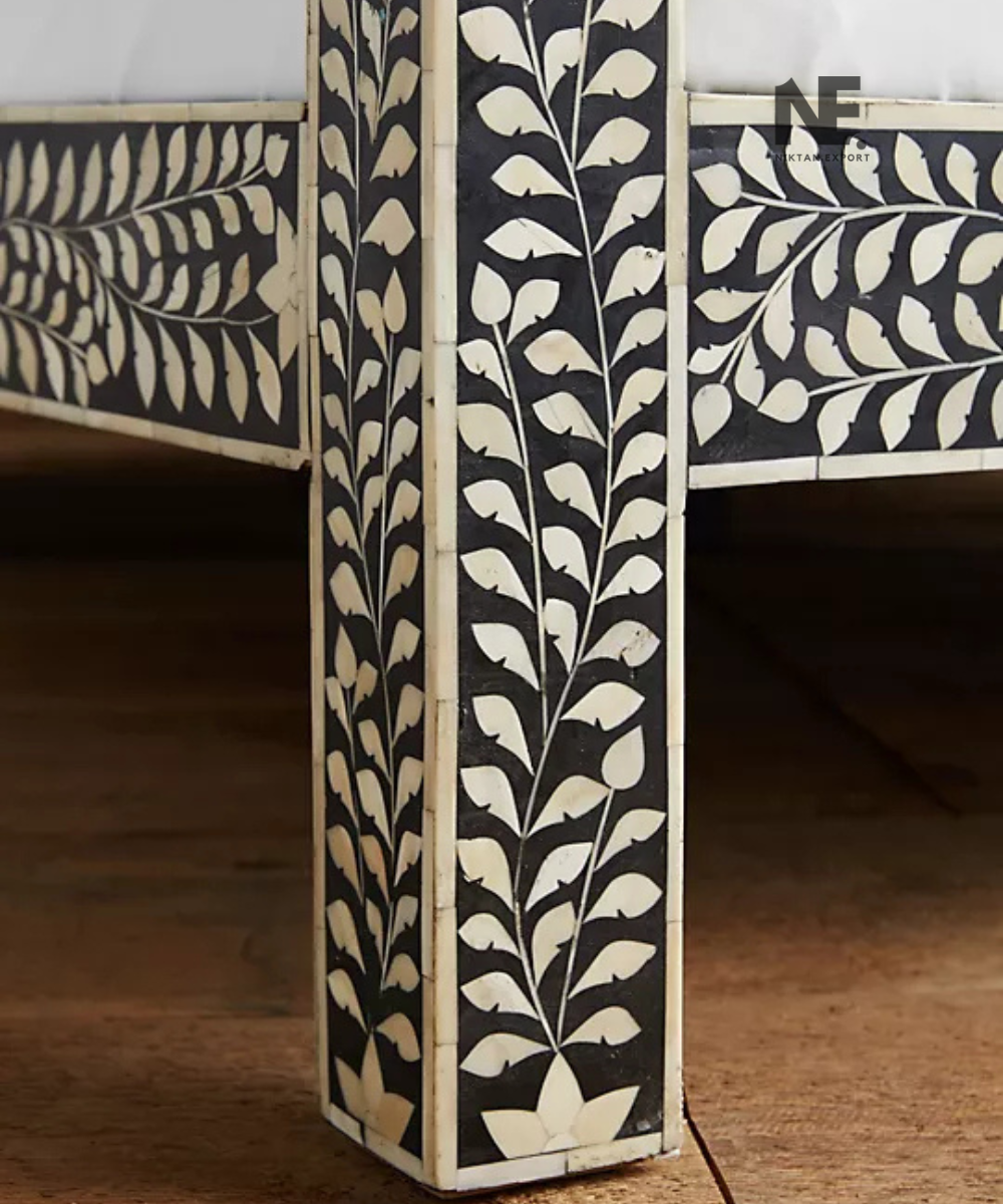 Four-poster bed frame with intricate ivory inlay