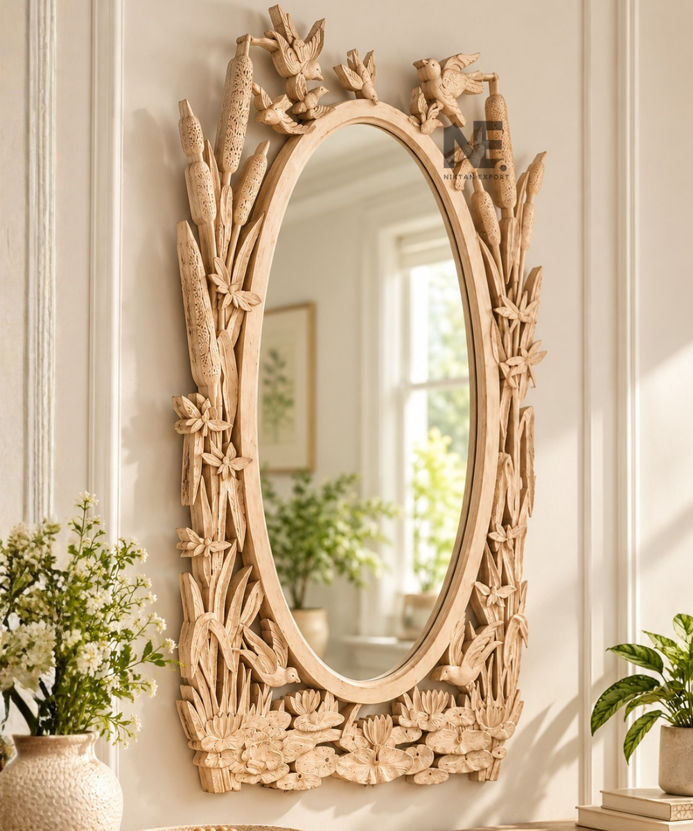 Nature-inspired carved wooden frame around an oval mirror