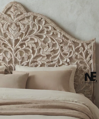 Whitewashed carved wood headboard