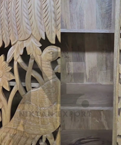 traditional carved wood wardrobe with golden knobs
